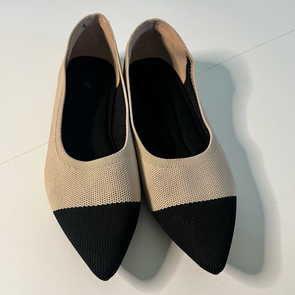 Chic Two-Tone Flats in Black and Cream